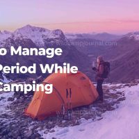 Period while wild camping - A solo woman's tent pitched high on a mountain ridge during a wild camping trip at sunrise
