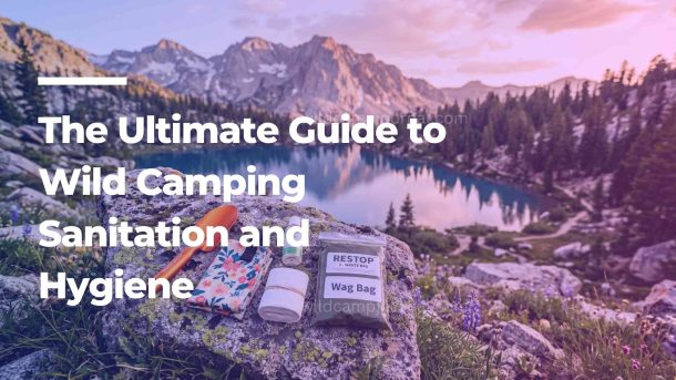 A complete wild camping sanitation kit featuring an ultralight trowel, hand sanitizer, and WAG bag laid out on a rock overlooking a mountain lake.